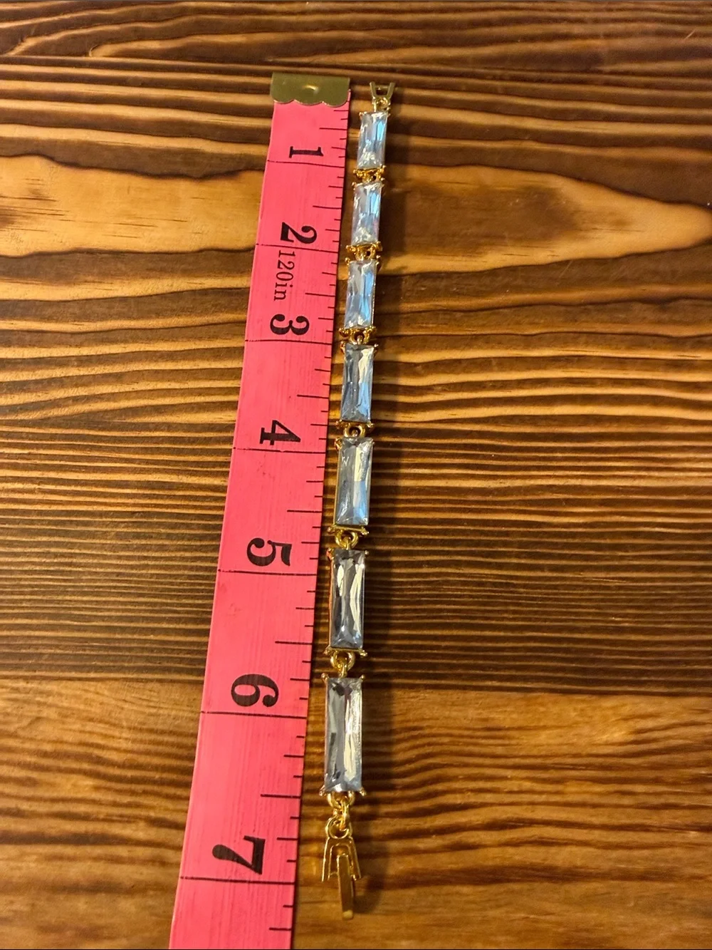 Gold tone with clear Tennis bracelet wiith baguette-cut stones